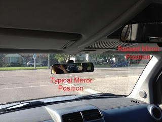 Rear view mirror blocking view for tall people so raise it up, and auxiliary mirror