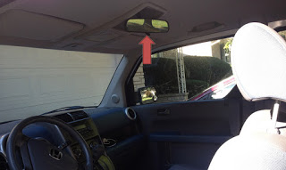 Rear view mirror blocking view for tall people so raise it up