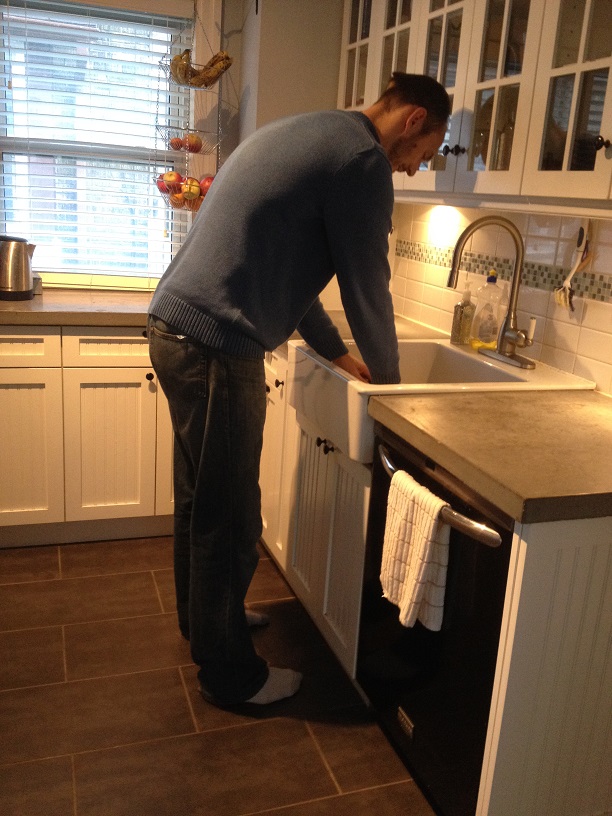Tall People Hunching to do Dishes